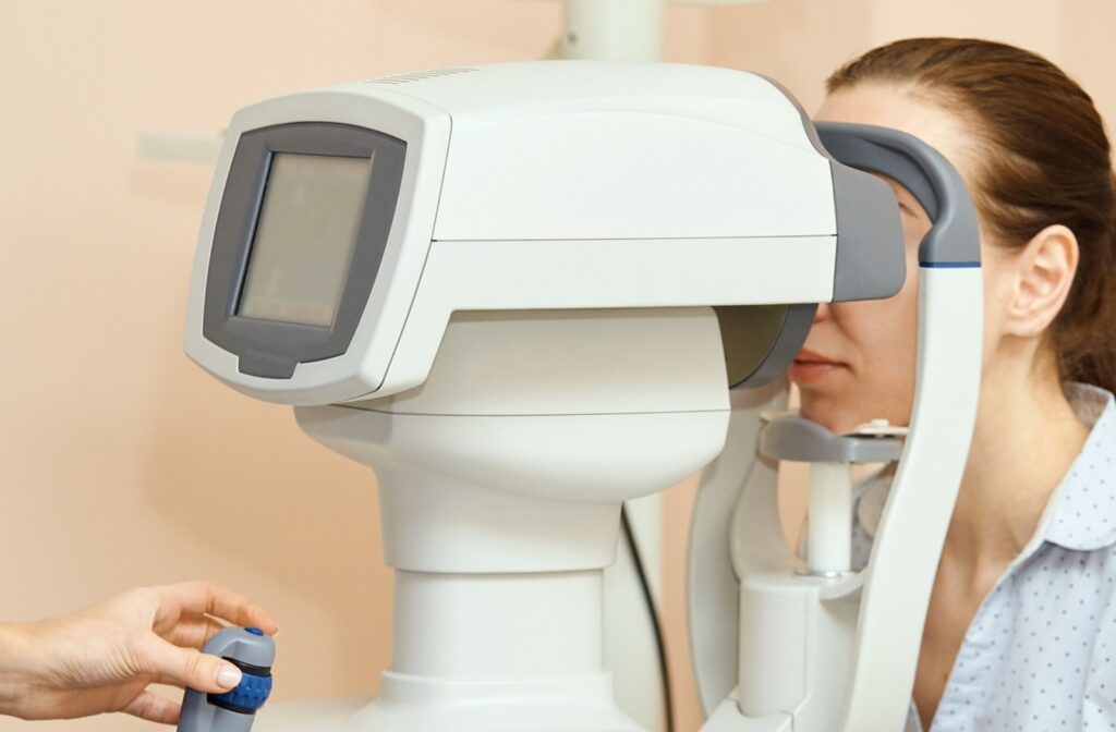 A female patient getting an eye exam at a local optometry